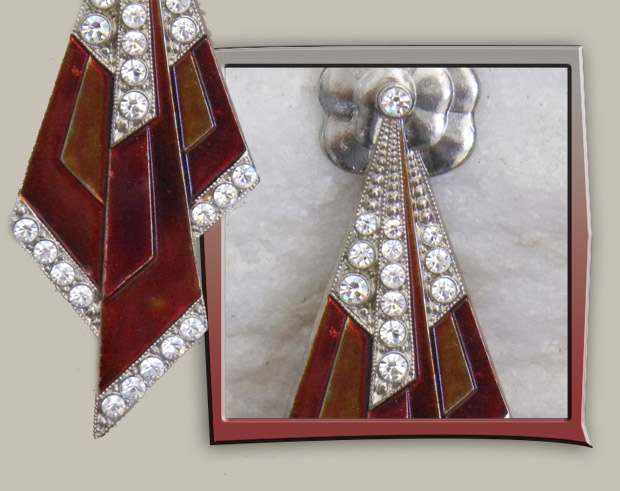 Unique enamel vintage brooch with red enamel and rhinestones forming a tie shape