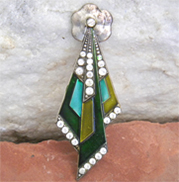 Unique enamel vintage brooch with green enamel and rhinestones