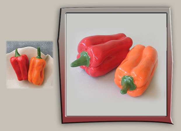 life-size sculptures of red and orange bell peppers
