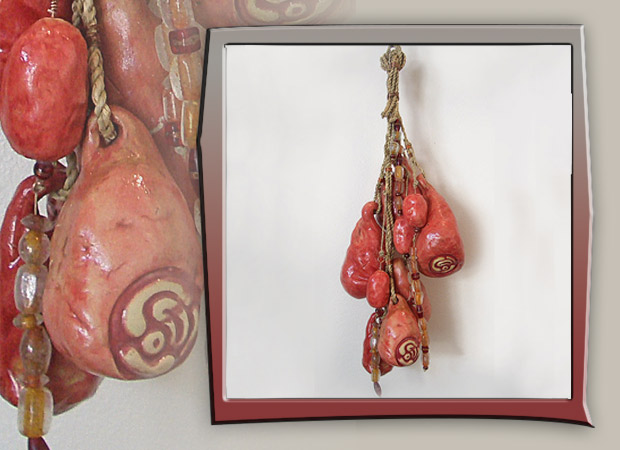 abstract red gourds in stoneware
    