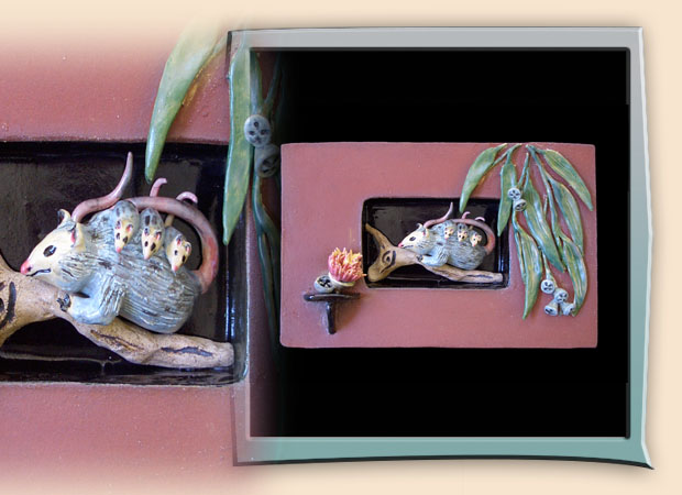 opossum family in ceramic niche box wll hanging