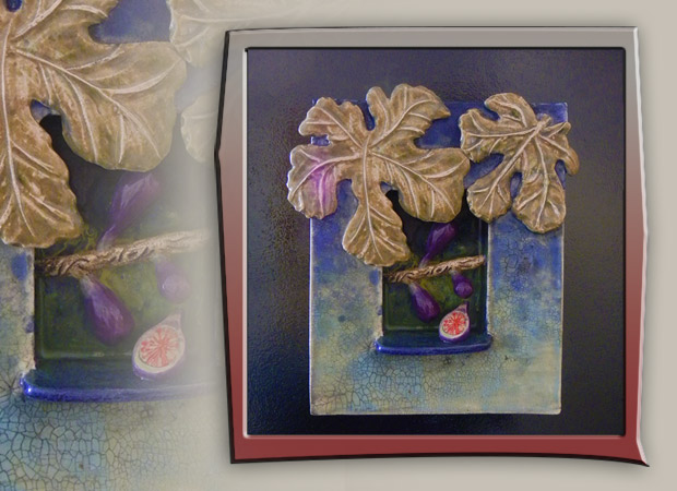 fig fruit in shadow box ceramic art with leaves and blue colors
    