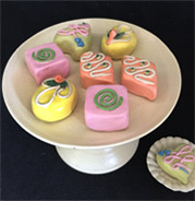 ceramic sculpture of pastry, petites fours