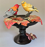 Scarlet Tanagers on Platter of Fall Leaves