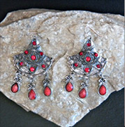 red dangles on silver triangles earrings