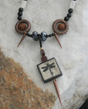 designer necklace with hipster dragonfly, bronze accents and black beads