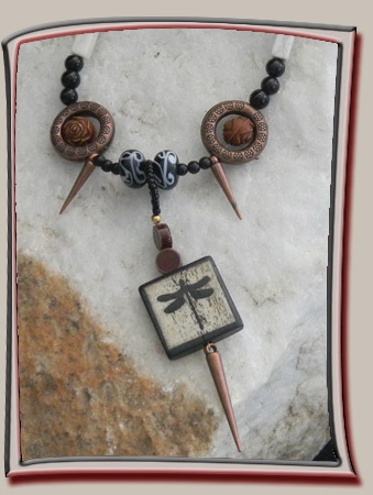 Dragonfly pendant with dart accents