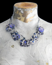 Playful animal print beaded choker in blue