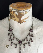 Charming bib necklace with multi-faceted lavender wire-wrapped beads