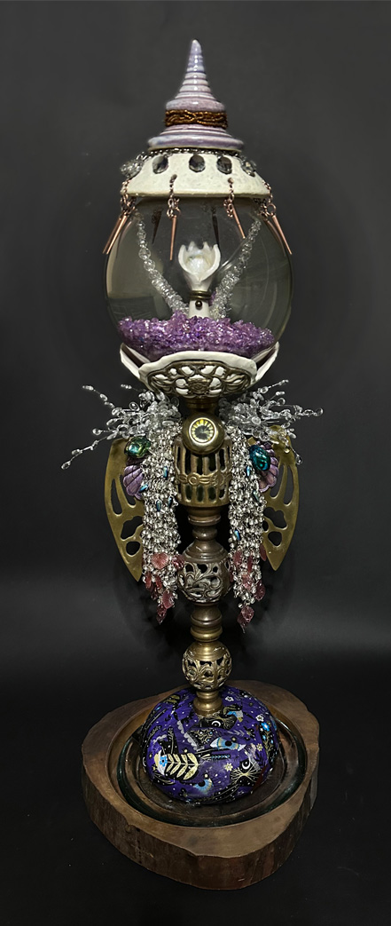 Steampunk assemblage art piece with ceramics and found object